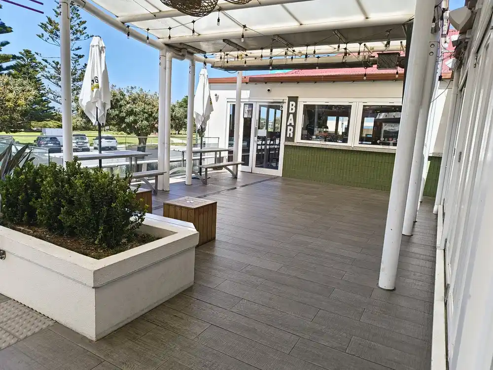 A timber-look tiled balcony after a clear non-slip coating